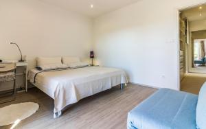 Postel nebo postele na pokoji v ubytování Apartman Bellavista