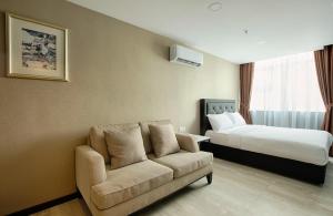 MTREE Hotel Nilai - KLIA Airport客房内的一张或多张床位