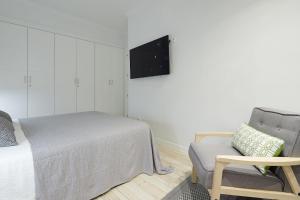 Telewizja i/lub zestaw kina domowego w obiekcie Soroa Apartment