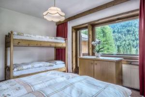 Posteľ alebo postele v izbe v ubytovaní Apartments Fiordalisi