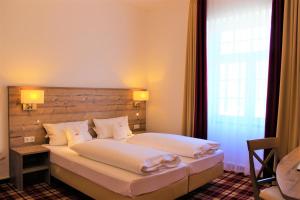 Postel nebo postele na pokoji v ubytování Hotel Haus Appel