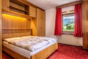 Posteľ alebo postele v izbe v ubytovaní Apartments Fiordalisi