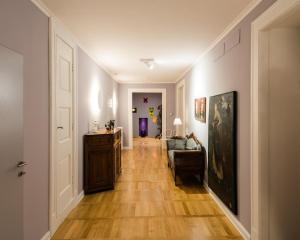 Televízia a/alebo spoločenská miestnosť v ubytovaní ViandanteHome, Luxury Rooms