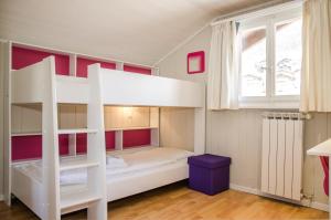 Ein Bett oder Betten in einem Zimmer der Unterkunft Chalet D