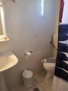 Kúpeľňa v ubytovaní Akti Rooms