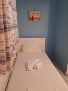 Posteľ alebo postele v izbe v ubytovaní Akti Rooms