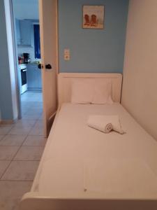 Posteľ alebo postele v izbe v ubytovaní Akti Rooms