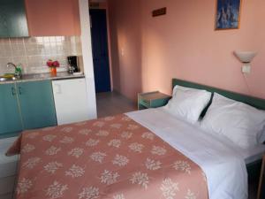 Posteľ alebo postele v izbe v ubytovaní Akti Rooms