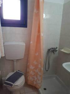 Kúpeľňa v ubytovaní Akti Rooms