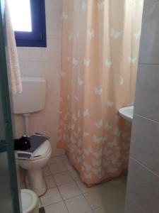 Kúpeľňa v ubytovaní Akti Rooms