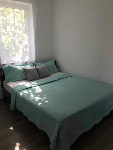 Postel nebo postele na pokoji v ubytování Apartman Dora Novalja