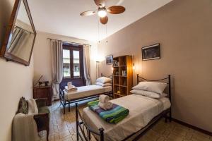 A bed or beds in a room at Piazza Bologna