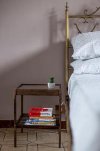 A bed or beds in a room at Piazza Bologna