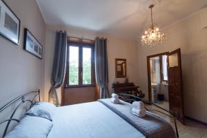A bed or beds in a room at Piazza Bologna