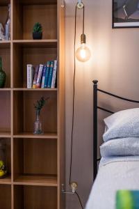 A bed or beds in a room at Piazza Bologna