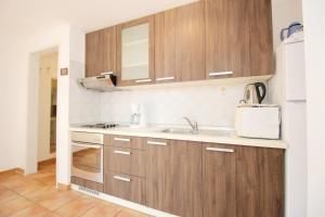 Kuchyňa alebo kuchynka v ubytovaní Apartment Pintar Beach