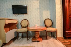 TV a/nebo společenská místnost v ubytování Srpsko Andrejevo Selo