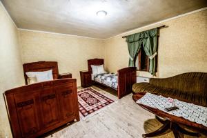Voodi või voodid majutusasutuse Srpsko Andrejevo Selo toas