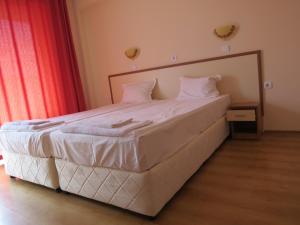 Postel nebo postele na pokoji v ubytování Family Hotel Dayana Beach