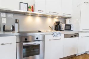 A cozinha ou kitchenette de Design Apartments I contactless check-in