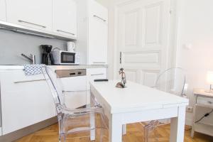 Kuchyň nebo kuchyňský kout v ubytování Design Apartments I contactless check-in