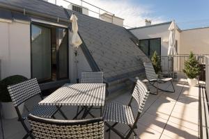 Patio lub wspólna przestrzeń na świeżym powietrzu w obiekcie Mar Suite Apartments - Center