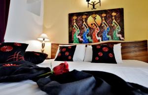 Postel nebo postele na pokoji v ubytování Chapel 5 Boutique Suites B&B