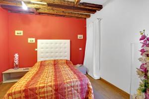 Łóżko lub łóżka w pokoju w obiekcie Fenix Otello Apartments