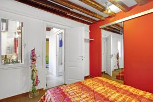 Łóżko lub łóżka w pokoju w obiekcie Fenix Otello Apartments
