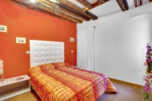 Łóżko lub łóżka w pokoju w obiekcie Fenix Otello Apartments