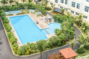 Vista de la piscina de Haikou Meilan·Hainan Univeristy· Locals Apartment 00141450 o d'una piscina que hi ha a prop