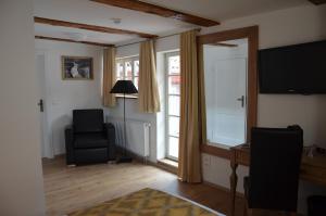 TV a/nebo společenská místnost v ubytování Hotel Hahnmühle 1323 + 27 fotografií