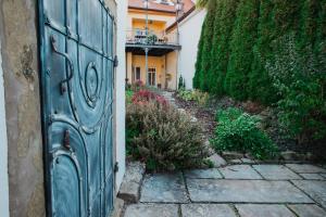 Un jardín fuera de Boutique Hotel Templ