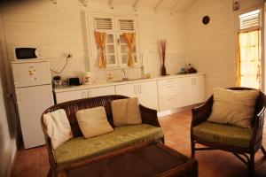 Η κουζίνα ή μικρή κουζίνα στο BUNGALOW BASSIN TROUVE