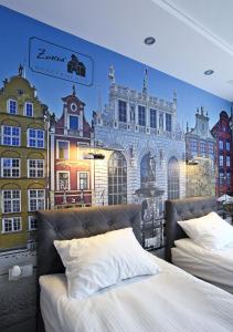 Posteľ alebo postele v izbe v ubytovaní Apartamenty Żuraw
