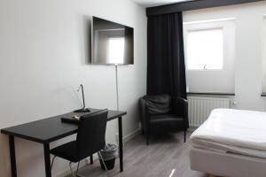 Postel nebo postele na pokoji v ubytování Best Western Hotel Tranas Statt