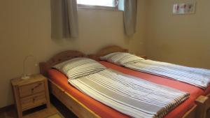 Postel nebo postele na pokoji v ubytování Ferienwohnung "Eifelstueffje"