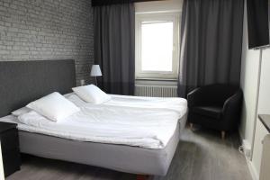 Postel nebo postele na pokoji v ubytování Best Western Hotel Tranas Statt