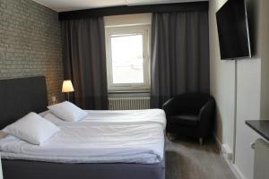 Postel nebo postele na pokoji v ubytování Best Western Hotel Tranas Statt