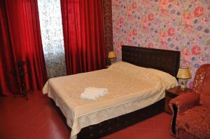 Postel nebo postele na pokoji v ubytování Voskhod Hotel
