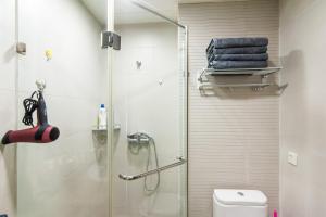 Phòng tắm tại Tianjin Nankai·Joy City· Locals Apartment 00142330