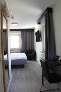 Postel nebo postele na pokoji v ubytování Best Western Hotel Tranas Statt