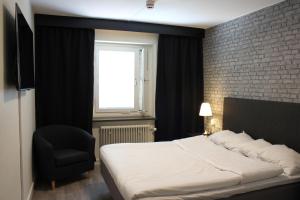 Postel nebo postele na pokoji v ubytování Best Western Hotel Tranas Statt