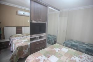 Postel nebo postele na pokoji v ubytování Lindo Apartamento Vista Mar