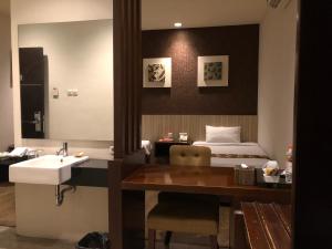Letto o letti in una camera di Hotel Sinar 1