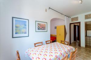 A bed or beds in a room at Corimbo