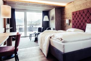 Posteľ alebo postele v izbe v ubytovaní Biohotel Bergzeit