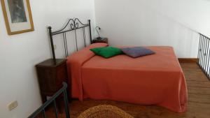 Posteľ alebo postele v izbe v ubytovaní Appartamento TRE QUERCE di Guerrini Patrizia