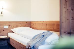 Posteľ alebo postele v izbe v ubytovaní Biohotel Bergzeit