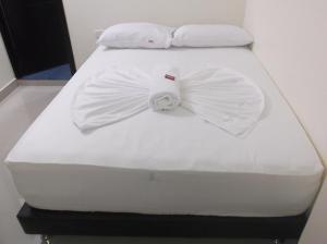 Hotel Monarca Putumayo客房内的一张或多张床位